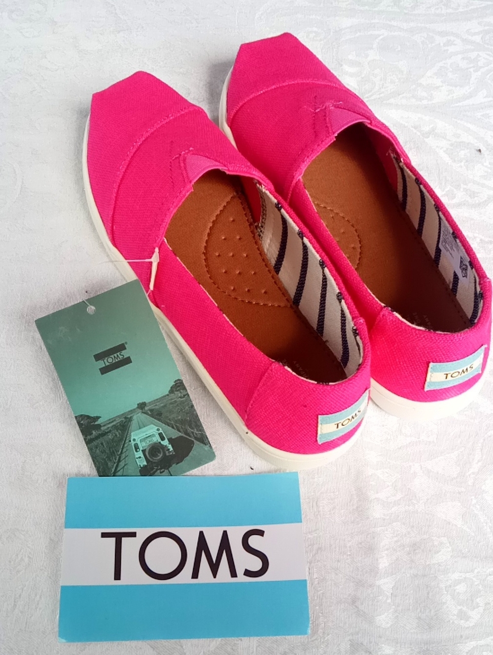 TOMS Kids Canvas Slip-On Moccasins in Hot Pink